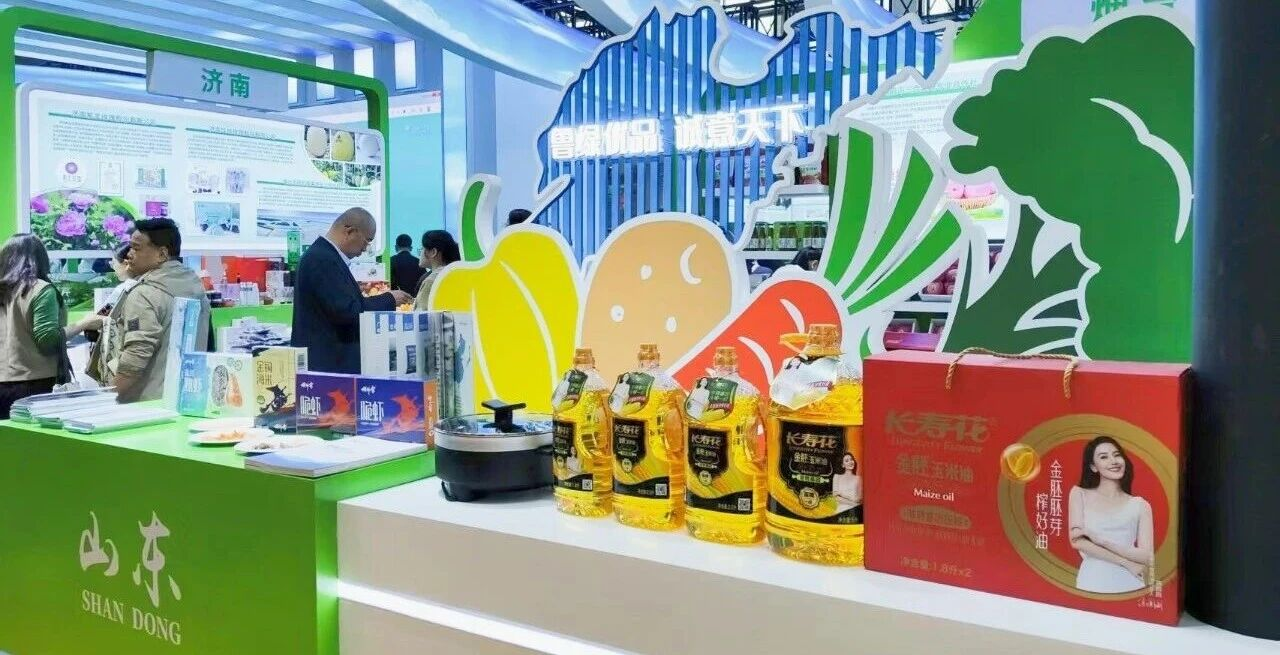 宝运莱食品闪灼中国绿色食品展览会 金胚玉米油领航绿色消费新海潮